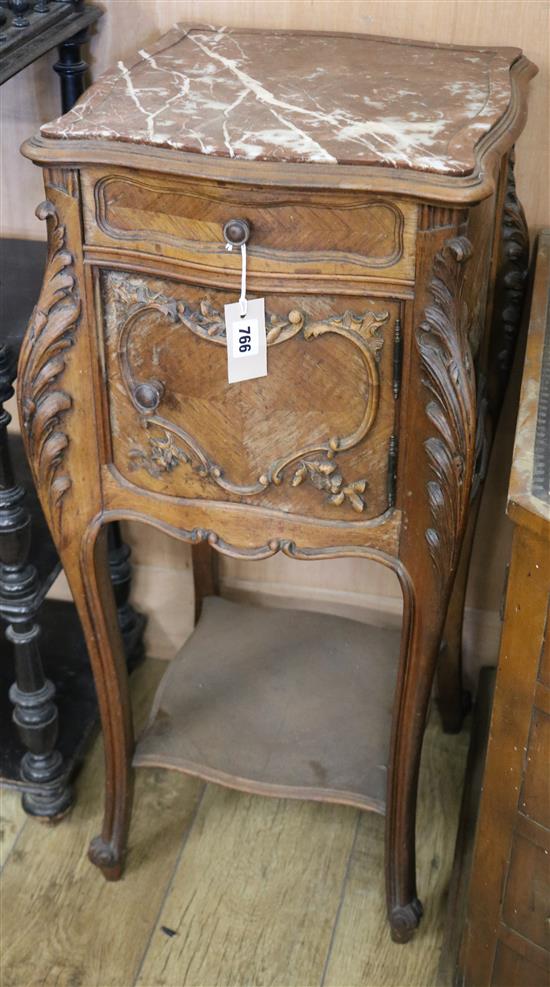 A late 19th century French carved walnut marble topped bedside cupboard W.40cm